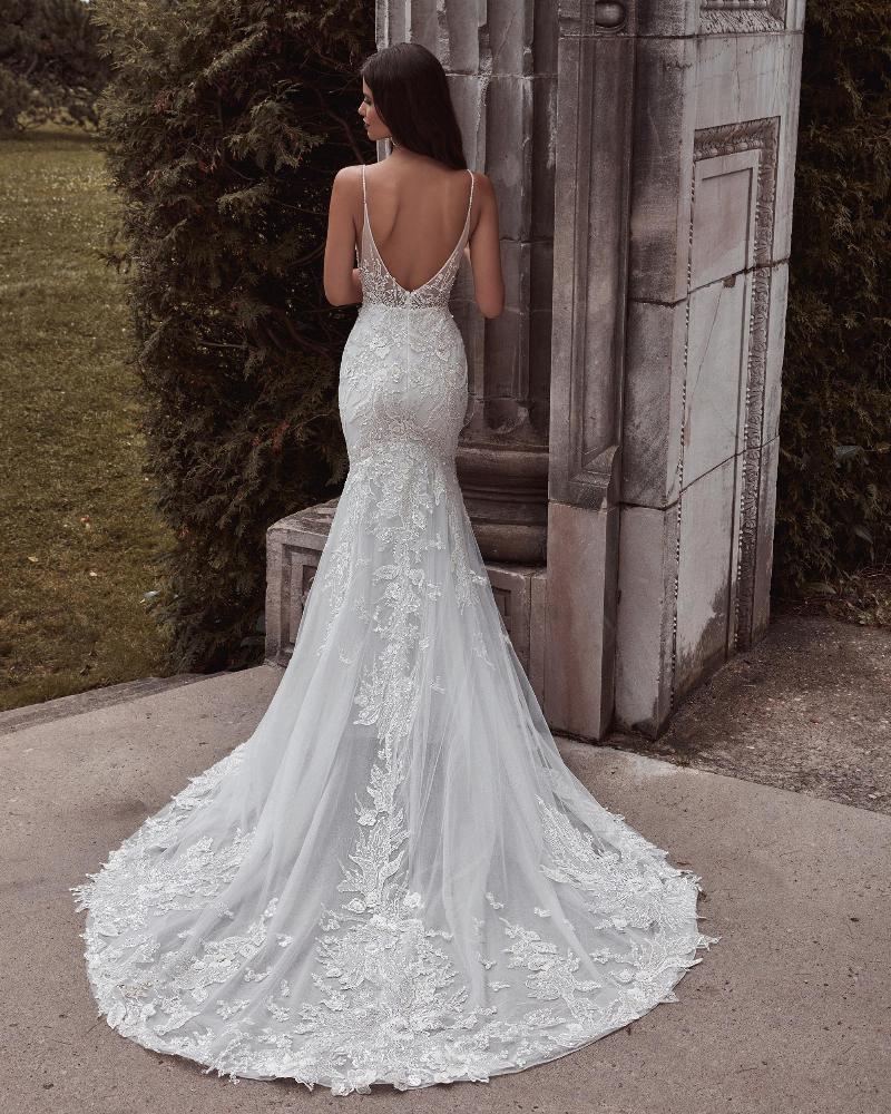 121104 fitted sparkly wedding dress with open back and spaghetti straps4